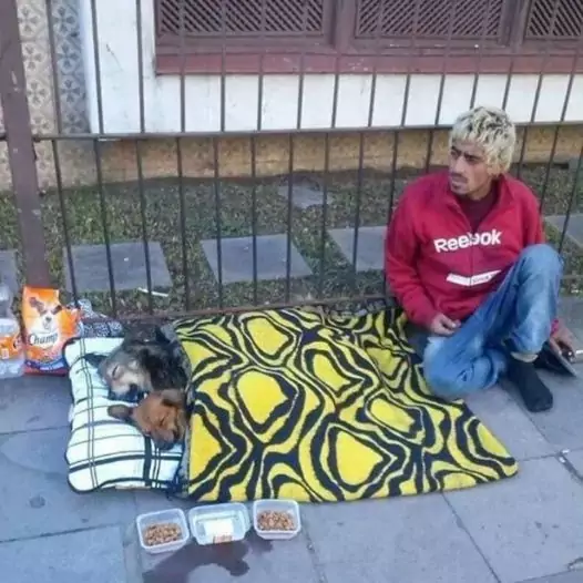 He is not rich but he has a big heart for his two dogs